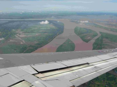 Coming in to the east approach of PP international airport. View on Mekong river and afflux from Tonle Sap river from the west.